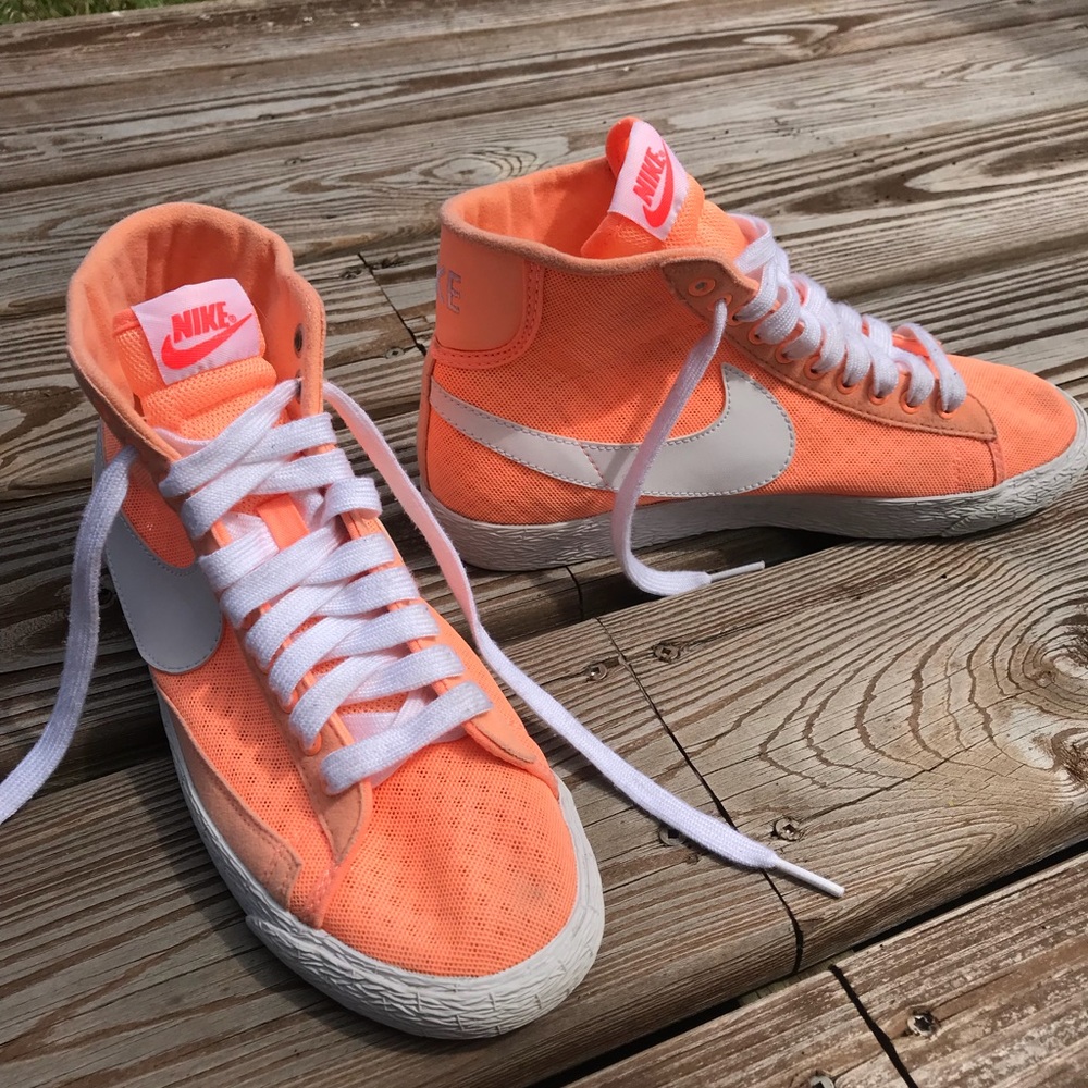 Woman’s high top Nike shoes